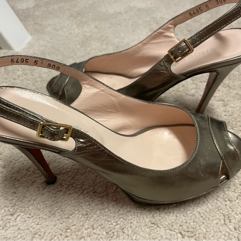 Copper heels with red sole.
